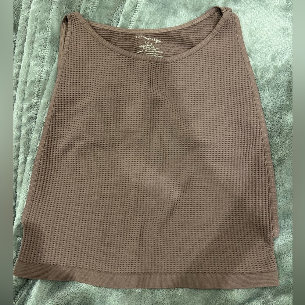Mauve cropped top, open sides. XS/S